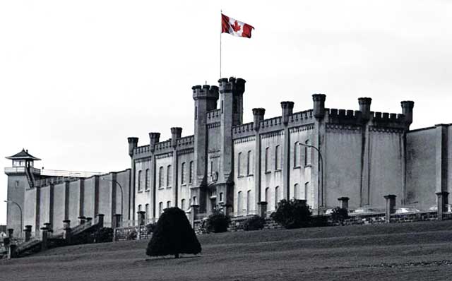 prison-with-red-flag prison-with-red-flag